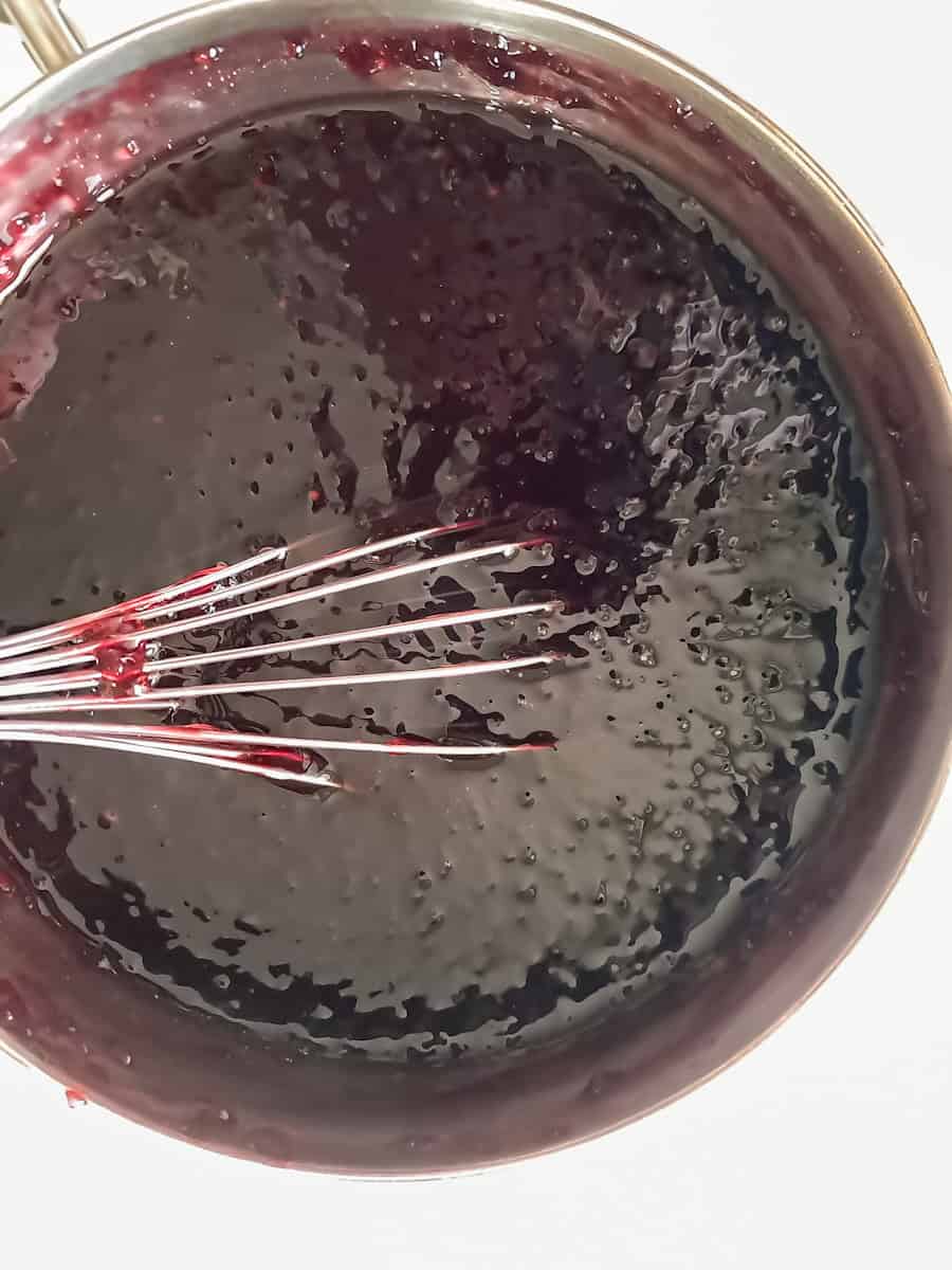 cooked grape tapioca in saucepan.