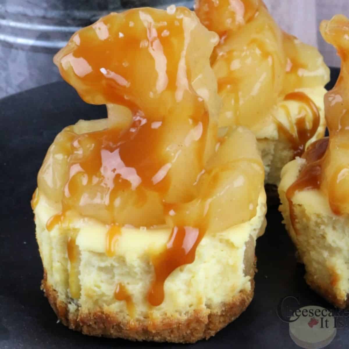 mini cheesecakes with apple pie filling and caramel topping.