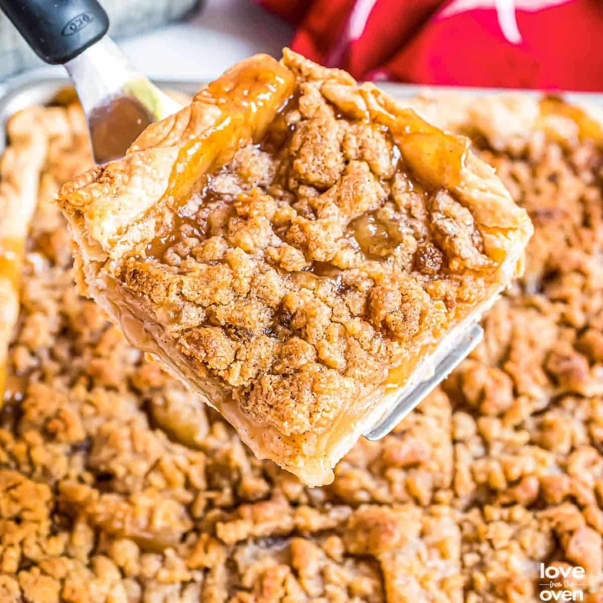 featuring a slice of apple slab pie.