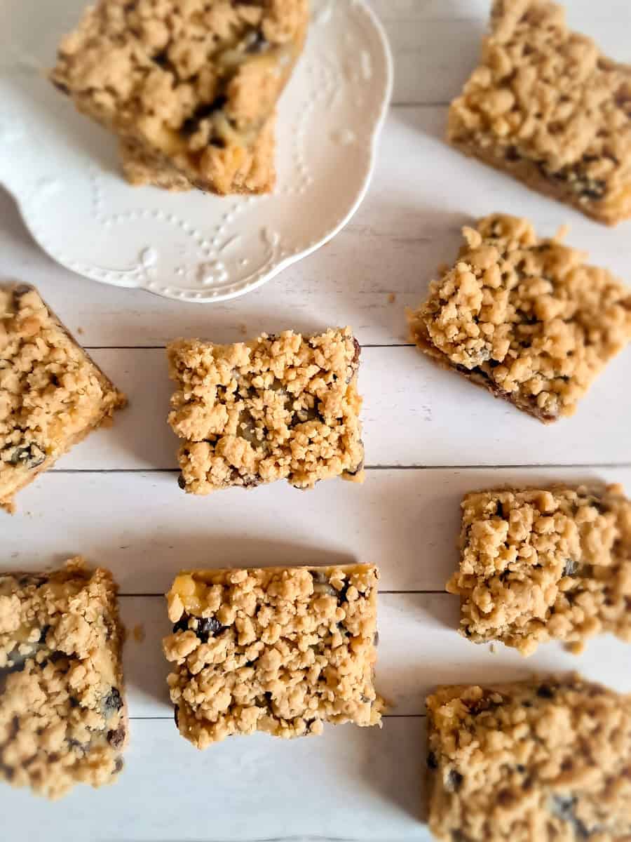 old-fashioned sour cream raisin bars on a white-striped background.