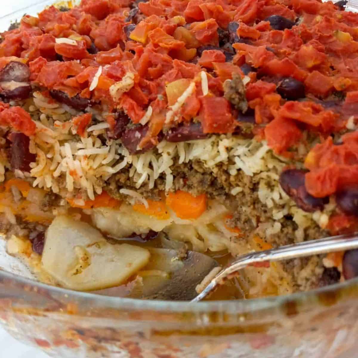 a casserole dish of Amish shipwreck casserole makes a dirt cheap meal for large families.