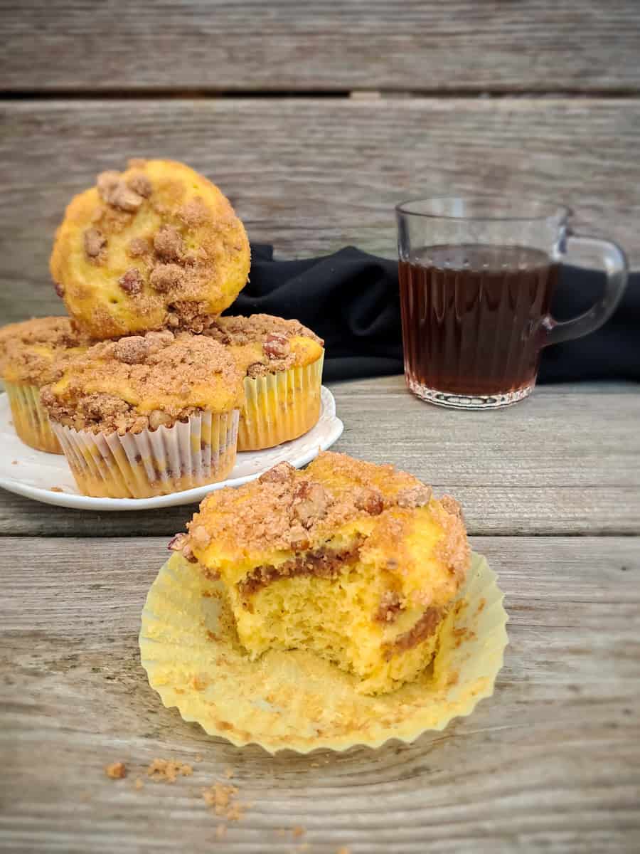 a bite out of a muffin to give you a look inside, and a cup of coffee on the side.