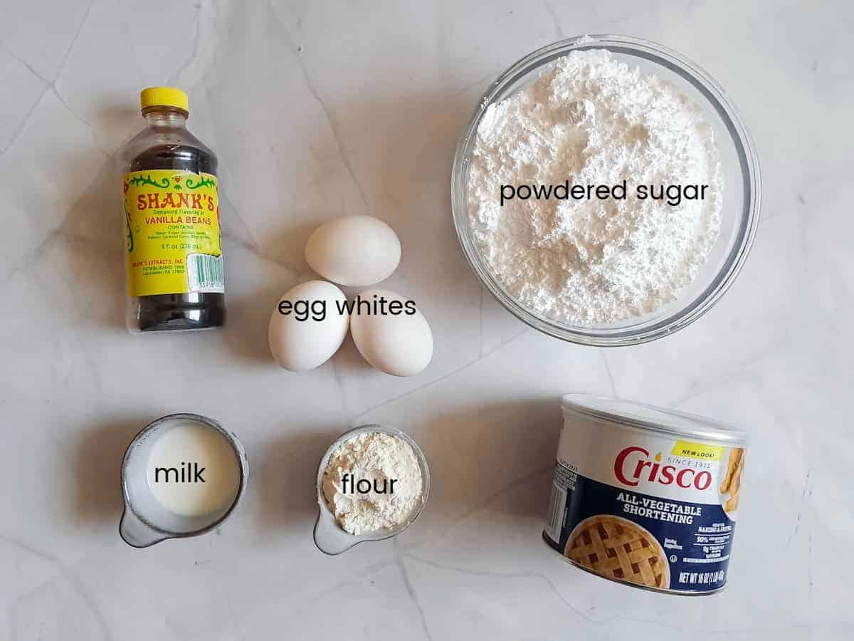 Ingredients: powdered sugar, Crisco, egg whites, milk, flour, and vanilla.