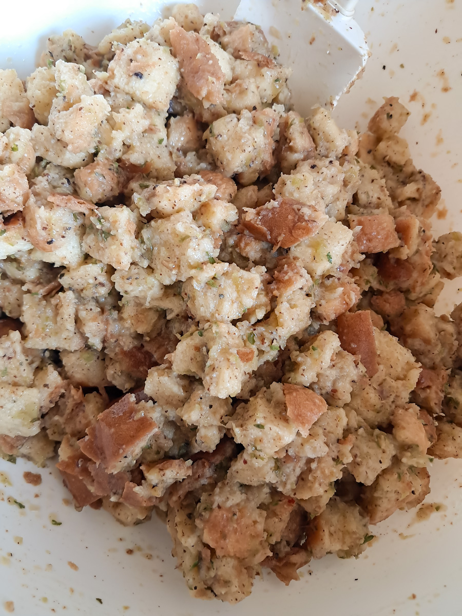 Amish dressing in a bowl ready to be baked.