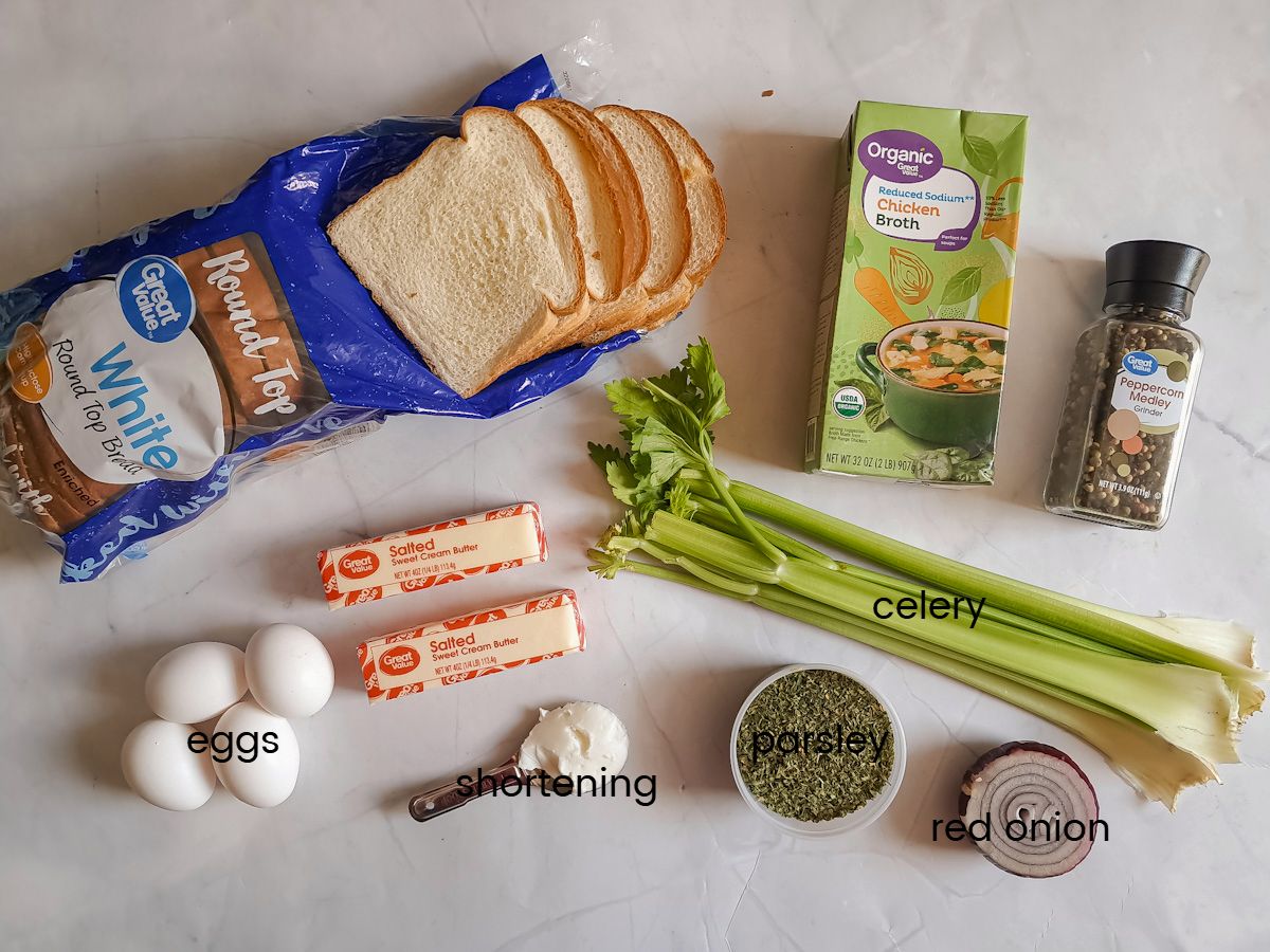 Ingredients: bread, butter, celery, onion, eggs, shortening, chicken broth, parsley flakes, and black pepper