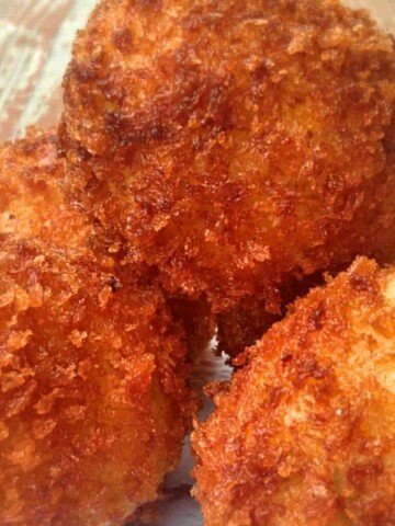 a stack of PA Dutch fried chicken croquette balls.