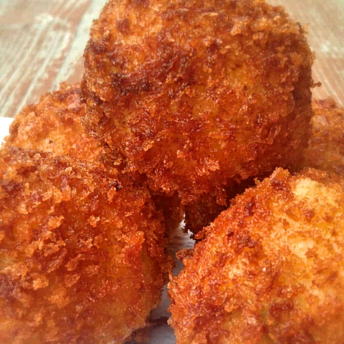 a stack of PA Dutch fried chicken croquette balls.