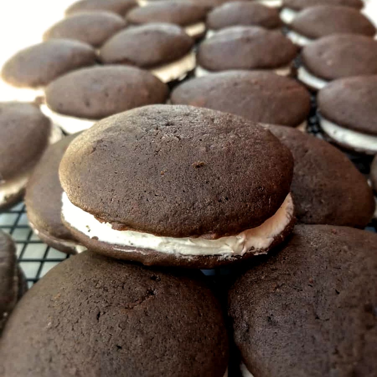 a stack of Amish chocolate whoopie pies may be served for Amish wedding food.