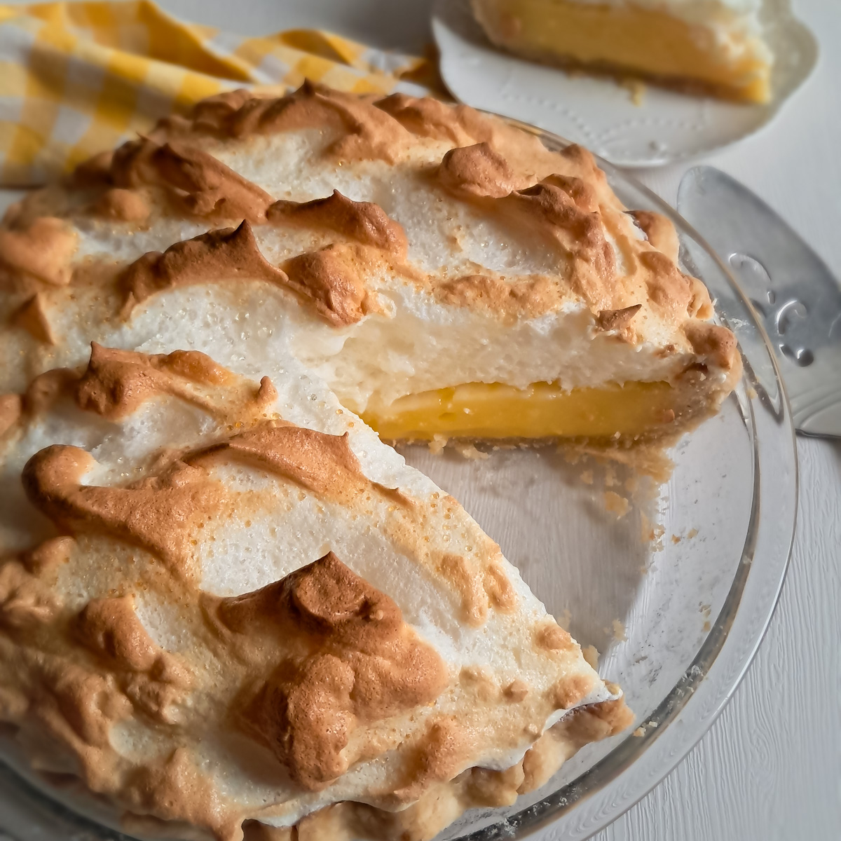 A 9" Amish lemon meringue pie with a slice removed - one of our favorite Amish pies.