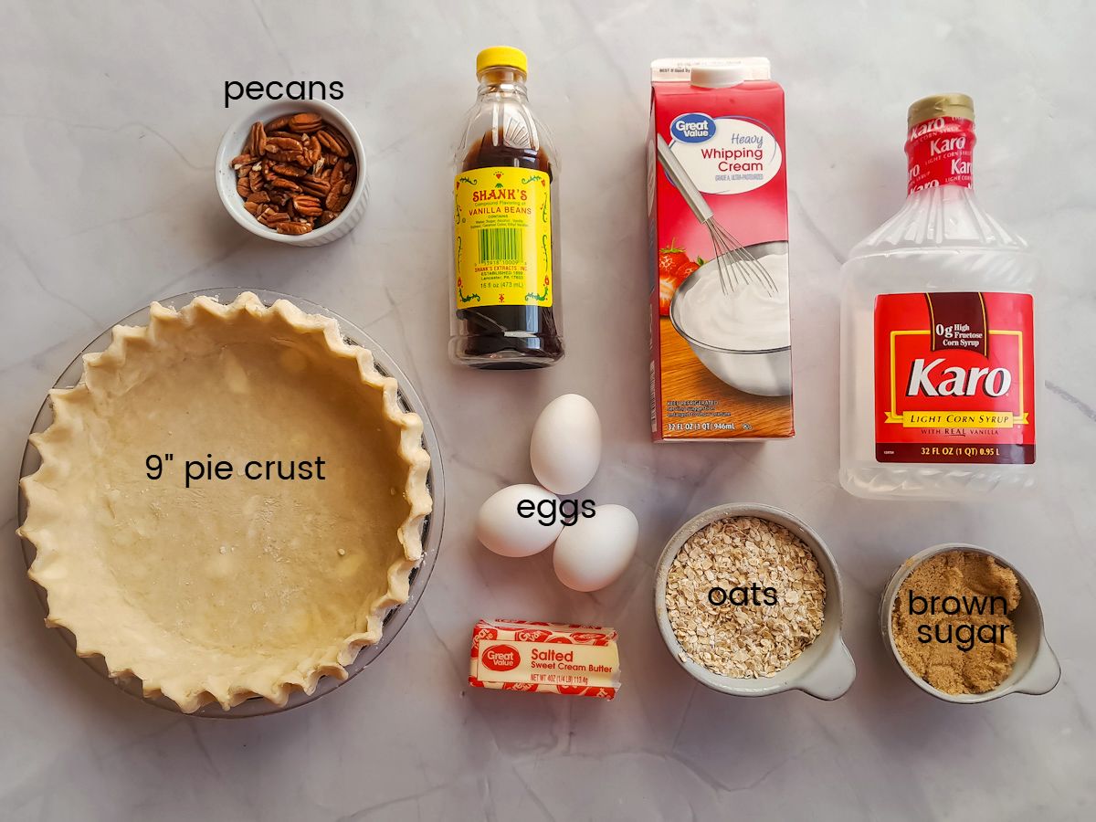 Ingredients: pie crust, pecans, vanilla, cream, karo, brown sugar, oats, eggs, and butter.