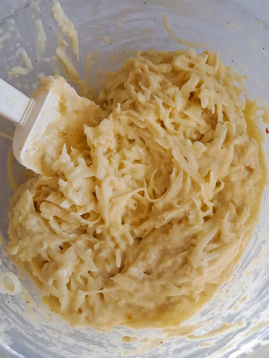 a bowl of potato pancake batter ready to fry.