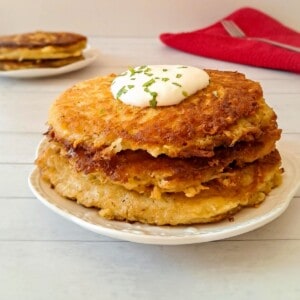 a stack of nicely browned Amish potato pancakes made with grated potatoes.