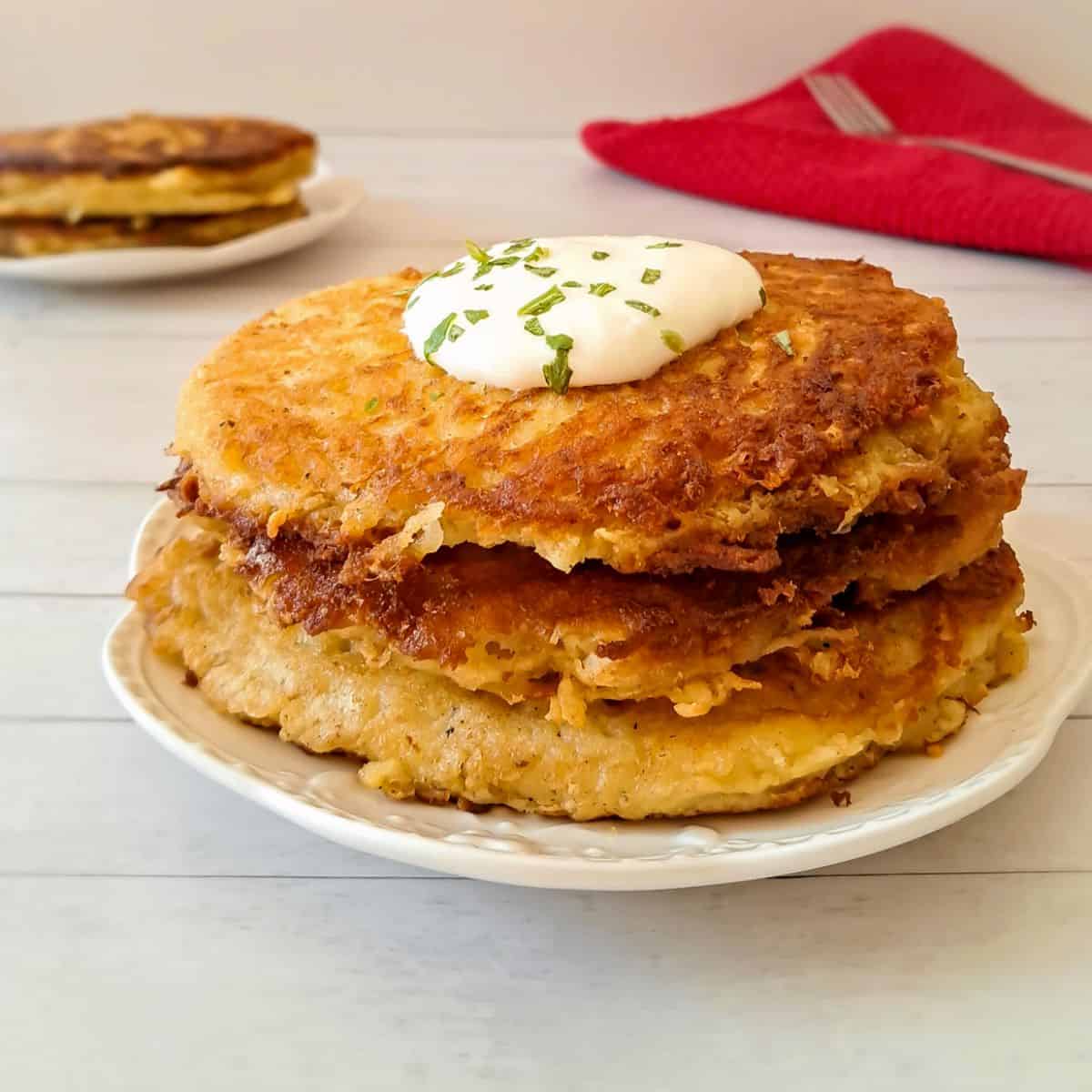 a stack of nicely browned Amish potato pancakes made with grated potatoes.
