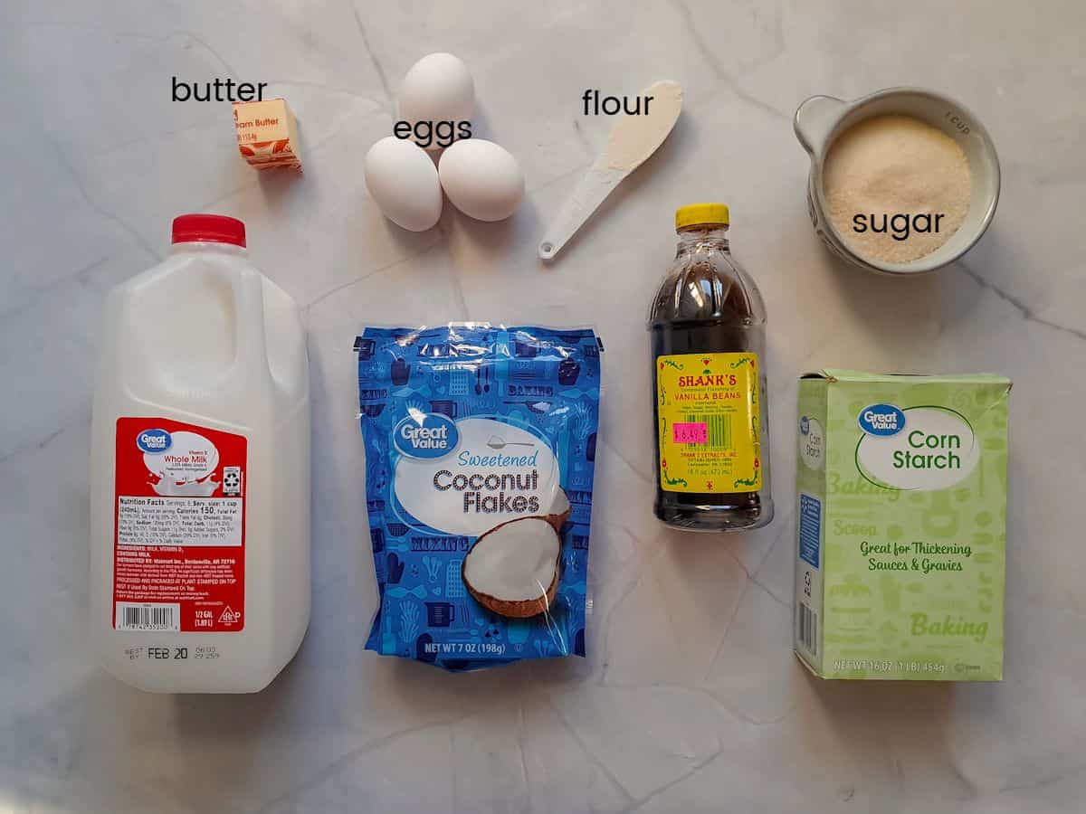 Ingredients: milk, butter, coconut flakes, sugar, egg yolks, vanilla, cornstarch, and flour.
