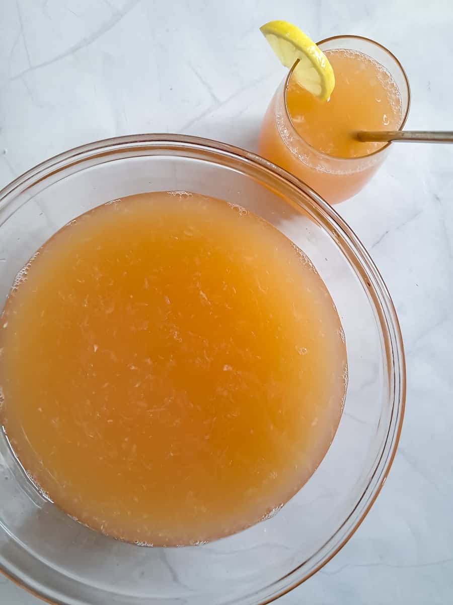 a big bowl full, as well as a cup, of sweet & tangy Amish rhubarb punch.