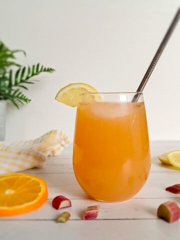 a cup of rhubarb punch with orange and lemon juice.
