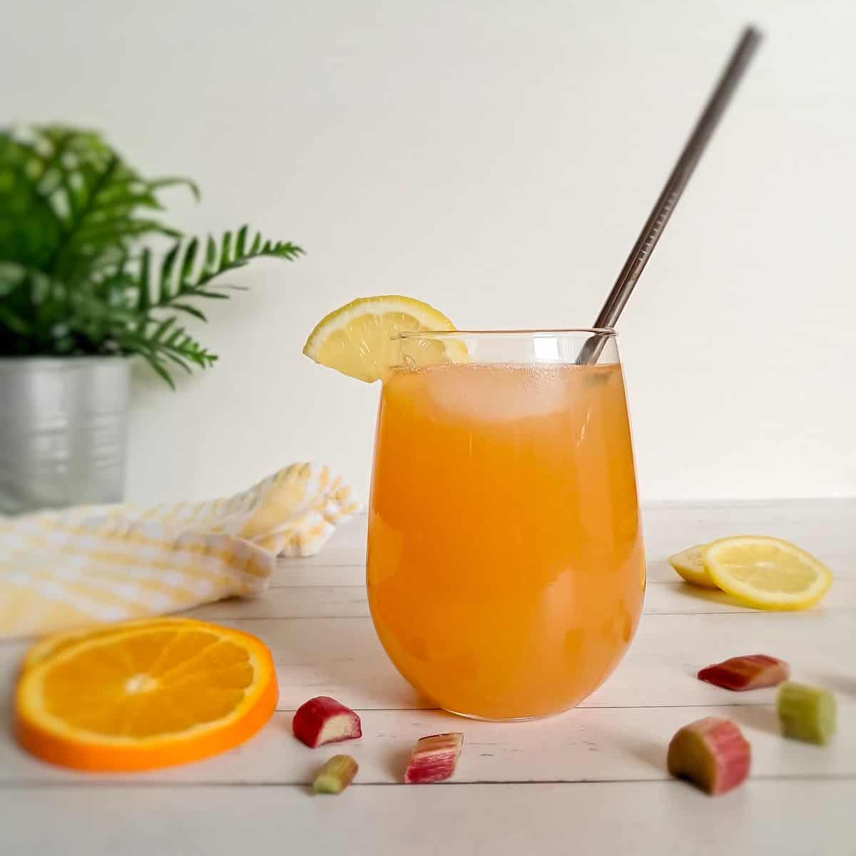a cup of rhubarb punch with orange and lemon juice.