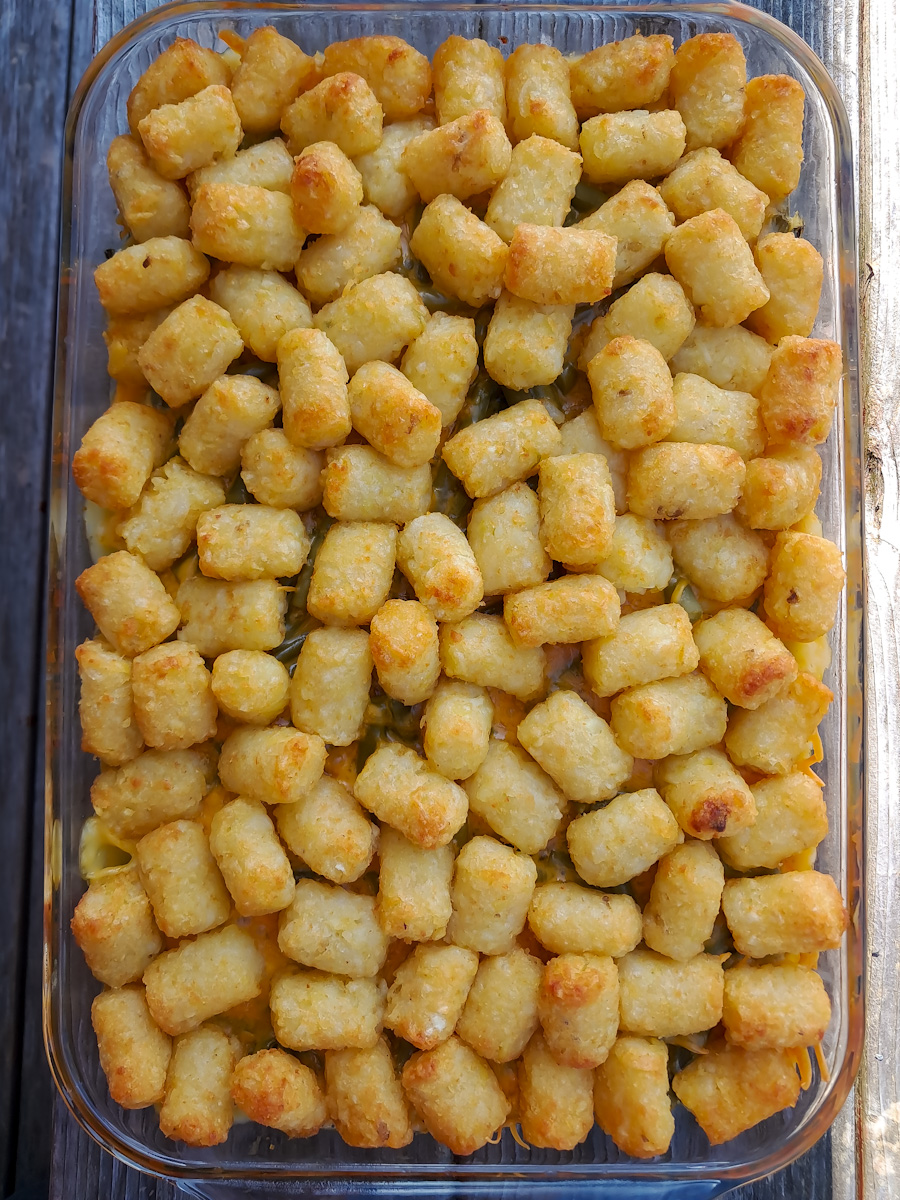 this 9x13" pan full of easy baked tater tot casserole is ready to eat.
