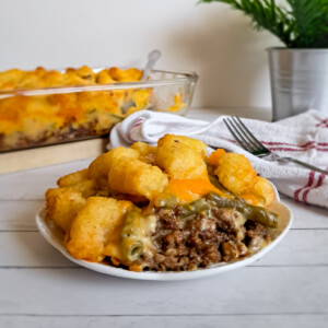 a plate filled with Easy Amish tater tot casserole.