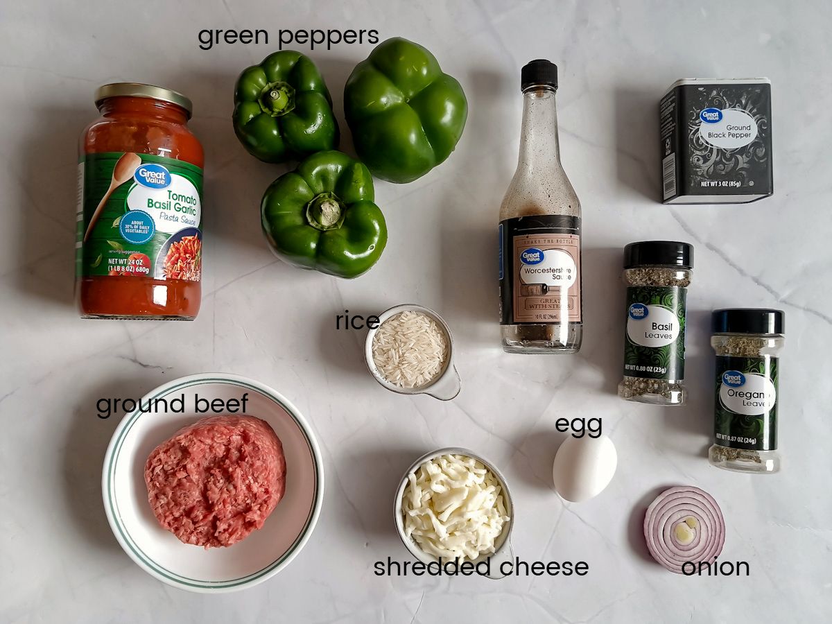 Ingredients: peppers, ground beef, onion, spaghetti sauce, rice, cheese, worcestershire sauce, egg, and seasonings.