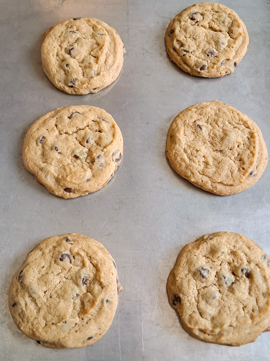 baked cookies on a large baking sheet.