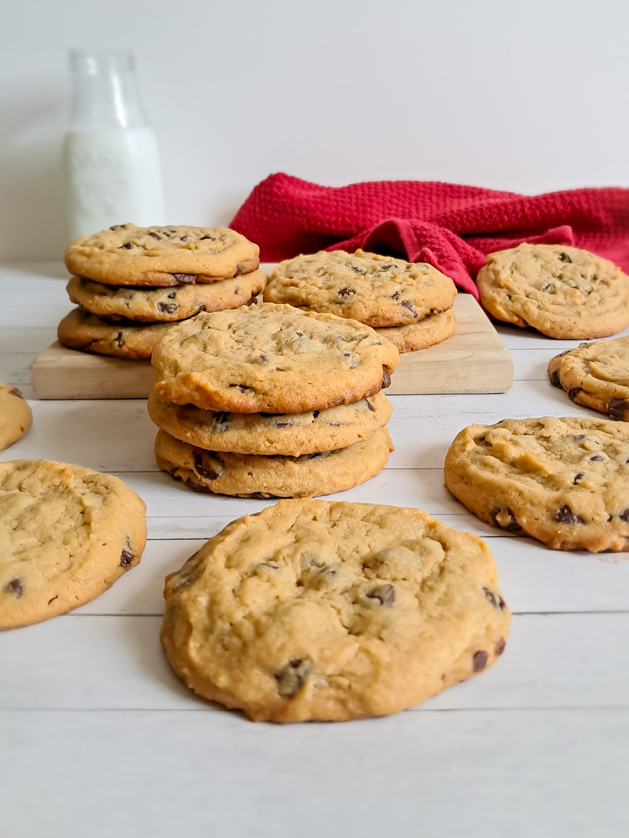 yummy looking Amish peanut butter chocolate chip cookies with a jar of milk.
