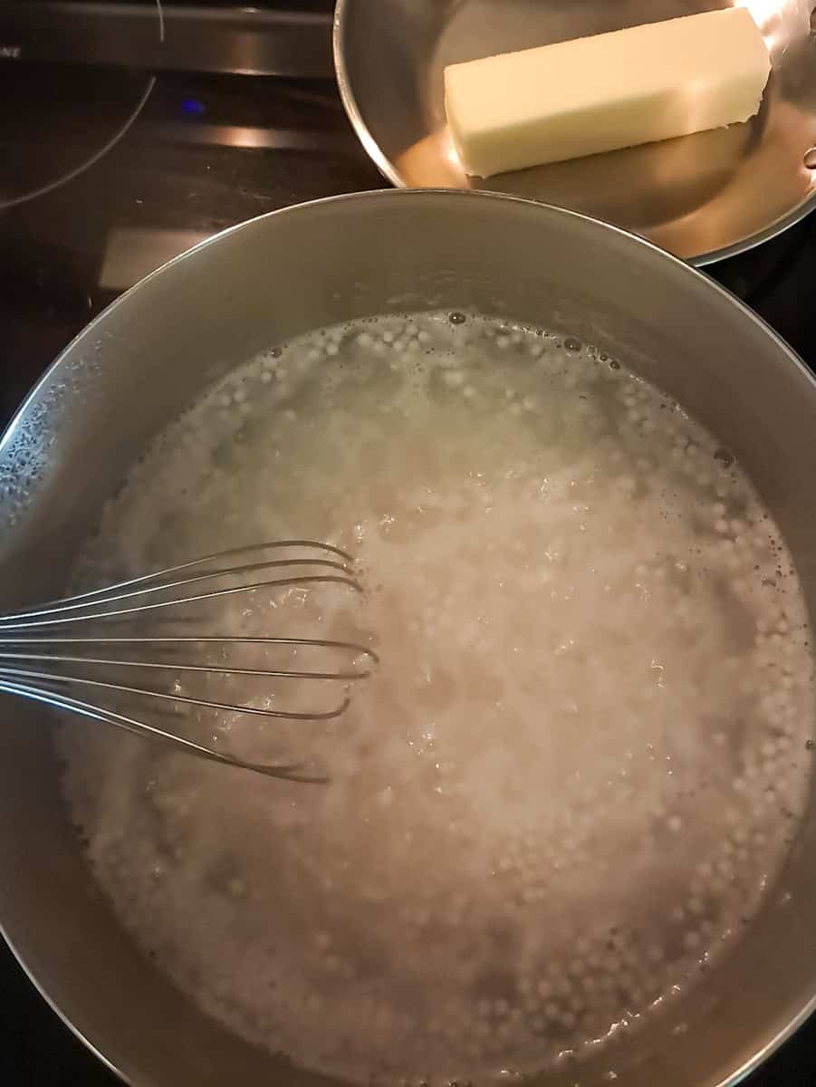cooking the pearls in a pot of water, and getting ready to brown the butter in a small skillet.