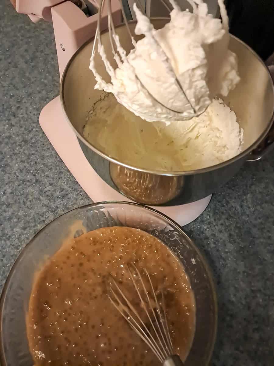 tapioca in a bowl and whipped cream in a mixing bowl, ready to mix the two together.