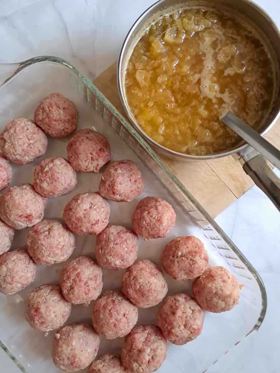 ham balls in a 9x13" pan and the pineapple glaze in a saucepan.